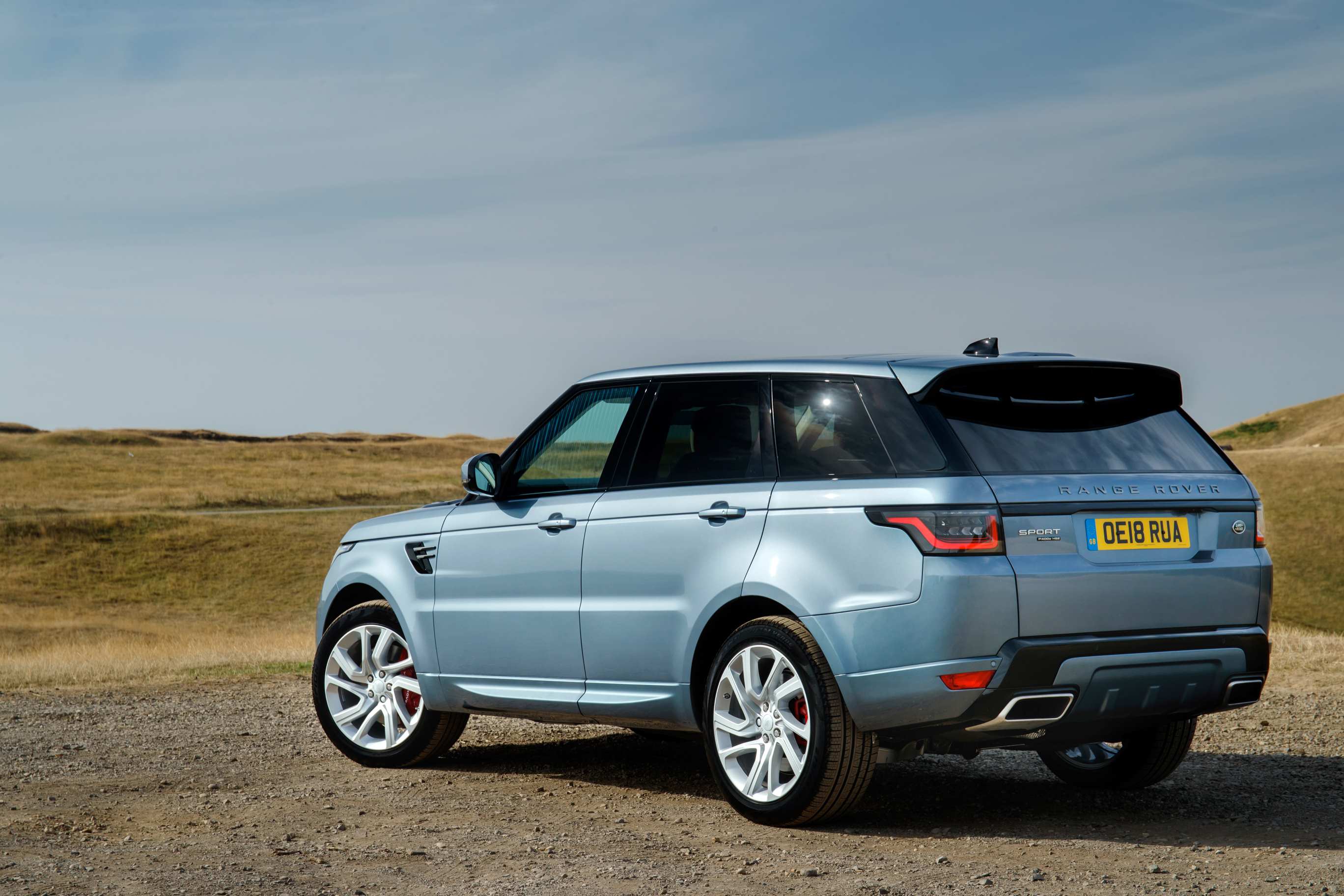 Silver Range Rover Sport p400e rear/left side
